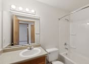 Thumbnail 21 of 74 - A bathroom with a sink, toilet, and bathtub  at The Timbers by Vintage, Arlington