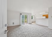 Thumbnail 20 of 74 - A white door is on the left of a room with a carpet  at The Timbers by Vintage, 98223