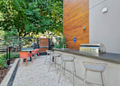 Thumbnail 25 of 37 - Patio with a bar and chairs at Luella, California