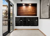Thumbnail 43 of 81 - a wall with a large wood panel on a wall in a room with a door