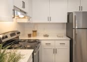 Thumbnail 3 of 38 - White Cabinets at THE ARLO, Citrus Heights, California