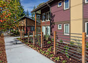 Thumbnail 25 of 25 - A row of houses with a sidewalk in front.at Bridge Meadows Beaverton 55+, Beaverton, 97005