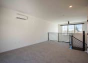 Thumbnail 21 of 41 - Large room with carpet at THE ANGELINO, Sacramento, CA 95819