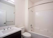 Thumbnail 30 of 41 - a bathroom with a sink toilet and bathtub at THE ANGELINO, Sacramento