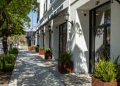 Thumbnail 10 of 41 - a sidewalk in front of a building at THE ANGELINO, California, 95819