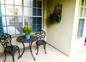 Thumbnail 9 of 11 - Patio with small table and chairs at ARBORS OF KILLEEN, KILLEEN, Texas