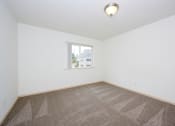 Thumbnail 14 of 24 - Bedroom with Plush Carpeting at Devonwood and First Place Apartments, Battle Ground, WA 98604