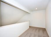 Thumbnail 12 of 24 - Upstairs Hallway with Plush Carpeting at Devonwood and First Place Apartments, Washington, 98604