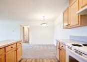 Thumbnail 7 of 24 - Dining area with overhead lighting at Devonwood and First Place Apartments, Battle Ground