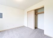 Thumbnail 13 of 24 - Bedroom with large closet at Devonwood and First Place Apartments, Battle Ground, WA 98604