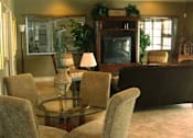 Thumbnail 4 of 15 - Clubhouse seating at Bernwood Trace Apartments, Fort Myers 33966