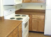 Thumbnail 4 of 16 - Kitchen With Cabinets at Bridge Meadows North Portland 55+, Portland