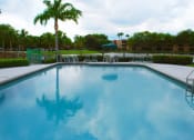 Thumbnail 3 of 14 - Pool with lounge chairs at Cross Keys, North Lauderdale