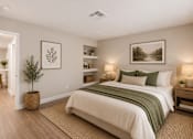 Thumbnail 21 of 22 - Spacious bedroom with natural wood flooring at Dash Apartments, Las Vegas, NV 89104