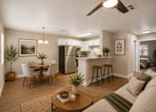 Thumbnail 16 of 22 - Open floor plan with kitchen and dining space at Dash Apartments, Las Vegas, 89104