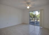 Thumbnail 3 of 9 - Living room with patio door at Doral Terrace, Doral, FL