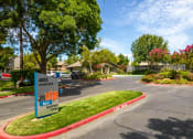 Thumbnail 3 of 19 - Entry to community with sign at THE EDGE Apartments, California, 95618