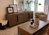 Thumbnail 29 of 34 - a living room with a couch and a coffee table at FARM BY VINTAGE, MILL CREEK, WA