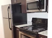 Thumbnail 9 of 11 - kitchen  at The Edge at Town Center Apartments, Jacksonville, Florida