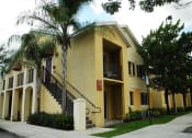 Thumbnail 9 of 11 - Exterior of building with grass at Alhambra Cove, Miami Florida