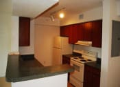 Thumbnail 4 of 11 - Kitchen with appliances at Alhambra Cove, Florida