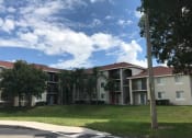 Thumbnail 2 of 7 - Grass area near buildings at Eagles Landing, Florida
