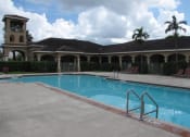 Thumbnail 4 of 7 - Swimming Pool with lounge chairs at Eagles Landing, Miami Gardens