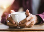 Thumbnail 9 of 21 - Enjoying a hot beverage at DOVER WOODS SENIOR APARTMENTS, Fairfield California
