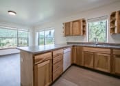 Thumbnail 2 of 8 - windows in kitchen and living area at TRILLIUM LANDING, Alaska, 99801