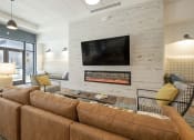 Thumbnail 7 of 34 - Clubhouse seating by fireplace at FARM BY VINTAGE, Washington