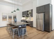Thumbnail 8 of 34 - Clubhouse kitchen and dining area at FARM BY VINTAGE, MILL CREEK