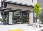 Thumbnail 2 of 34 - Leasing Office With Parking In Front And Car Charger at FARM BY VINTAGE, Washington, 98012