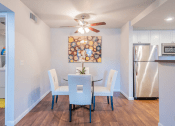 Thumbnail 12 of 19 - Dining area near kitchen at THE EDGE Apartments, California, 95618
