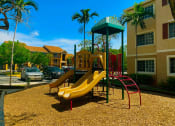 Thumbnail 6 of 13 - Playground near the buildings at Hibiscus Pointe, Florida , 33147