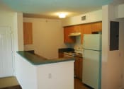Thumbnail 9 of 13 - Kitchen with appliances at Hibiscus Pointe, Miami, FL 33147