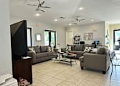Thumbnail 8 of 21 - a living room filled with furniture and a flat screen tv at SUMMERBREEZE & SUMMERSET, ST. AUGUSTINE