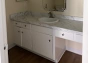 Thumbnail 17 of 19 - A white bathroom with a walk in shower and a toilet.at Via Casitas, Greenbrae, CA 94904