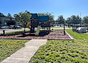 Thumbnail 14 of 21 - a playground with a slide and monkey bars at SUMMERBREEZE & SUMMERSET, Full State, 32086