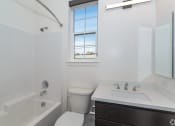 Thumbnail 31 of 41 - a bathroom with a tub and a toilet at THE ANGELINO, Sacramento, CA