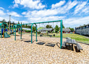 Thumbnail 4 of 20 - A playground at Lake Washington Apartments, Seattle, WA 98118