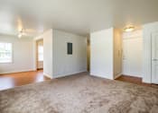 Thumbnail 9 of 20 - A spacious room with a carpeted floor and white walls.at Lake Washington Apartments, Seattle