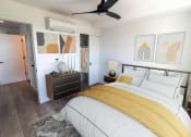Thumbnail 17 of 24 - a bedroom with a bed and a ceiling fan at Luella, Sacramento, CA