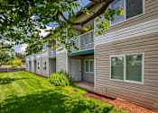 Thumbnail 25 of 37 - A building with a green lawn in front.at Vancouver Mall Apartments, Vancouver, WA 98662 ? 