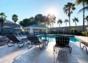 Thumbnail 6 of 28 - Pool deck at Oaks at Pompano, Pompano Beach, FL, 33060