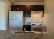 Thumbnail 10 of 28 - Kitchen at Oaks at Pompano, Pompano Beach, Florida