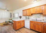 Thumbnail 13 of 34 - Furnished Kitchen at Fairview Village Homes, Fairview, OR