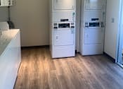 Thumbnail 5 of 24 - Laundry Room at OTAVON APARTMENTS, Novato, CA 94947