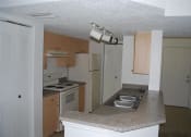 Thumbnail 13 of 20 - Portofino Apartments kitchen with lots of counter top space at Portofino, Palm Springs, FL, 33461