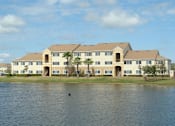 Thumbnail 4 of 15 - community exterior and lake views at Mission Bay Apartments, Rockledge, 32955
