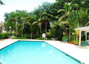 Thumbnail 4 of 18 - Pool with lounge chairs  at Bay Winds, Miami, FL